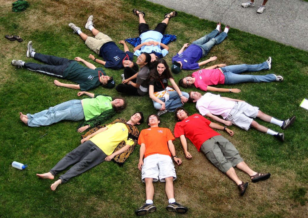 Photo of colorful group hanging out on the quad