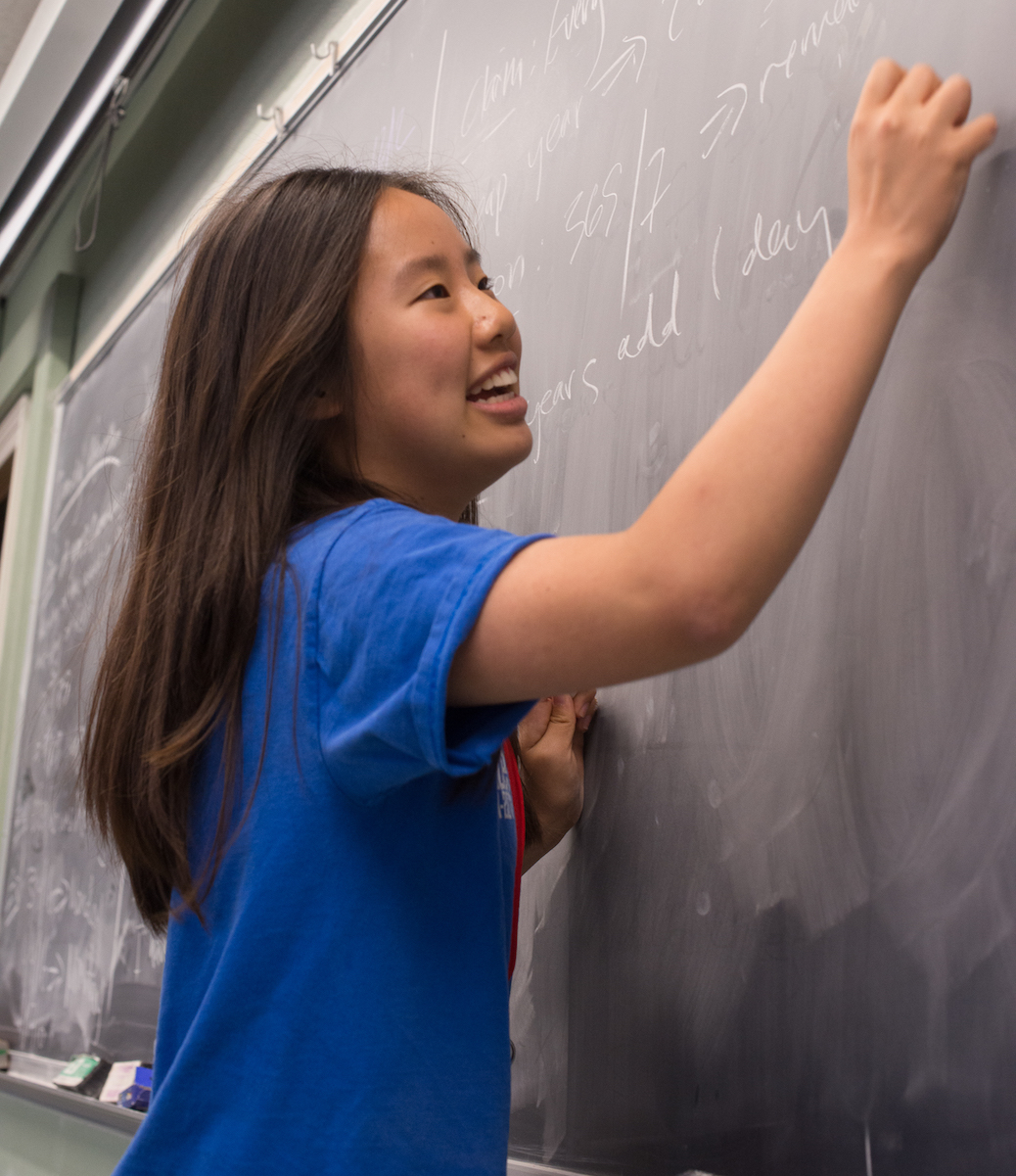 Photo of a student teaching at camp