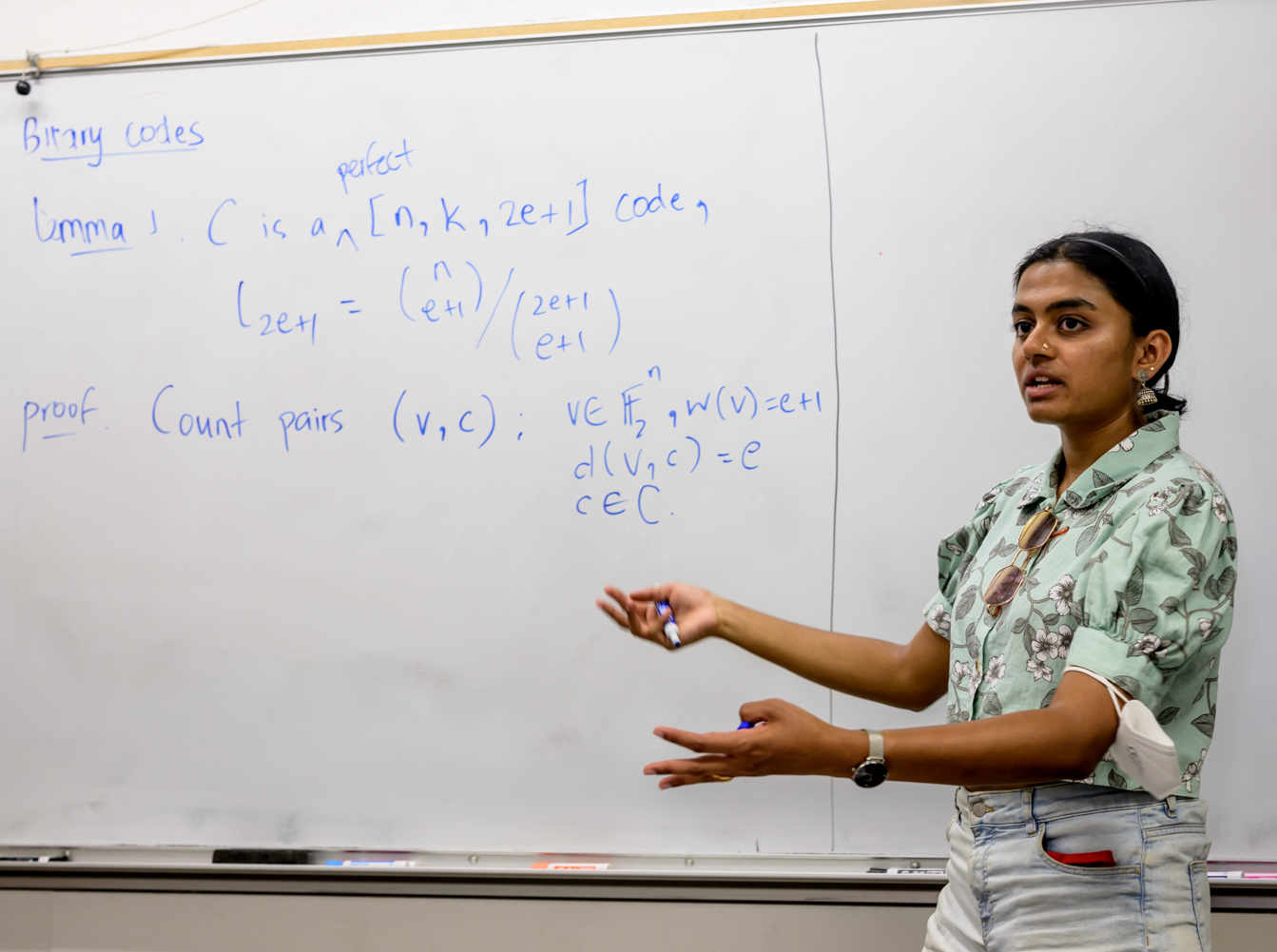 Photo of a Mathcamp mentor teaching a class.